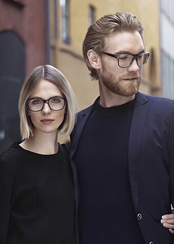 Man and Women Wearing Persol Eyewear